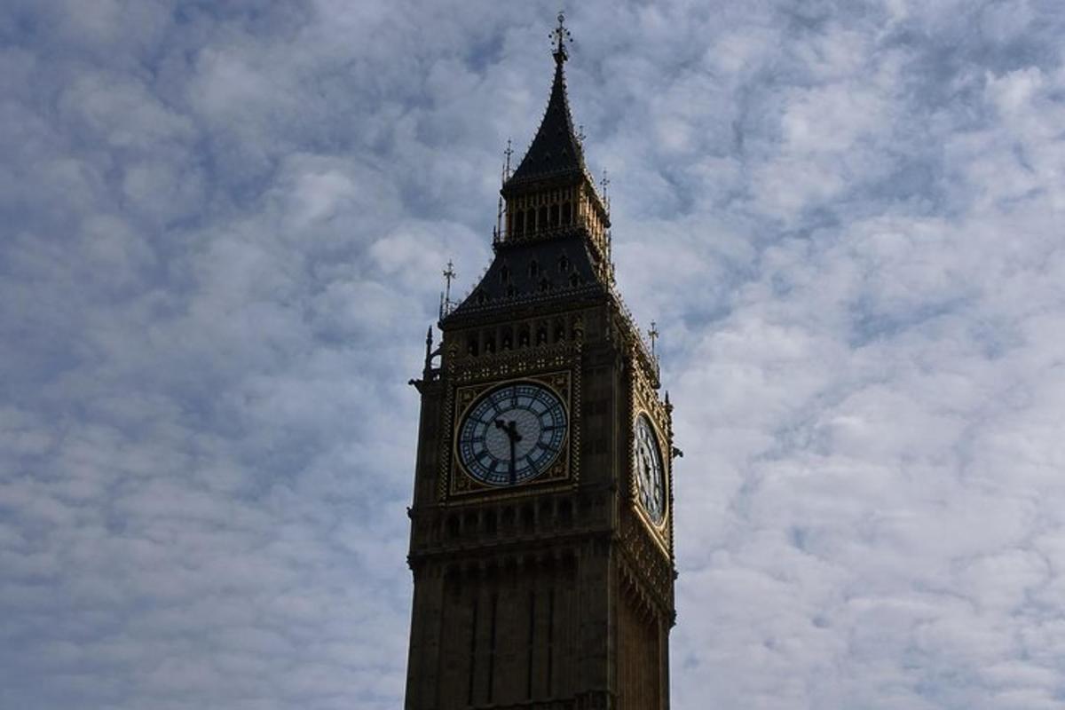 a tall tower with a clock on top of big ben