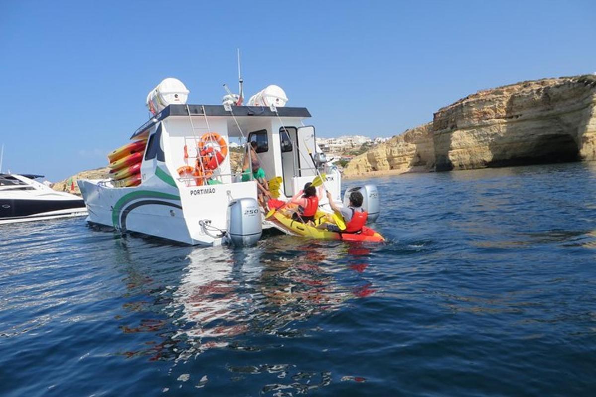 a couple of people in a boat in the water