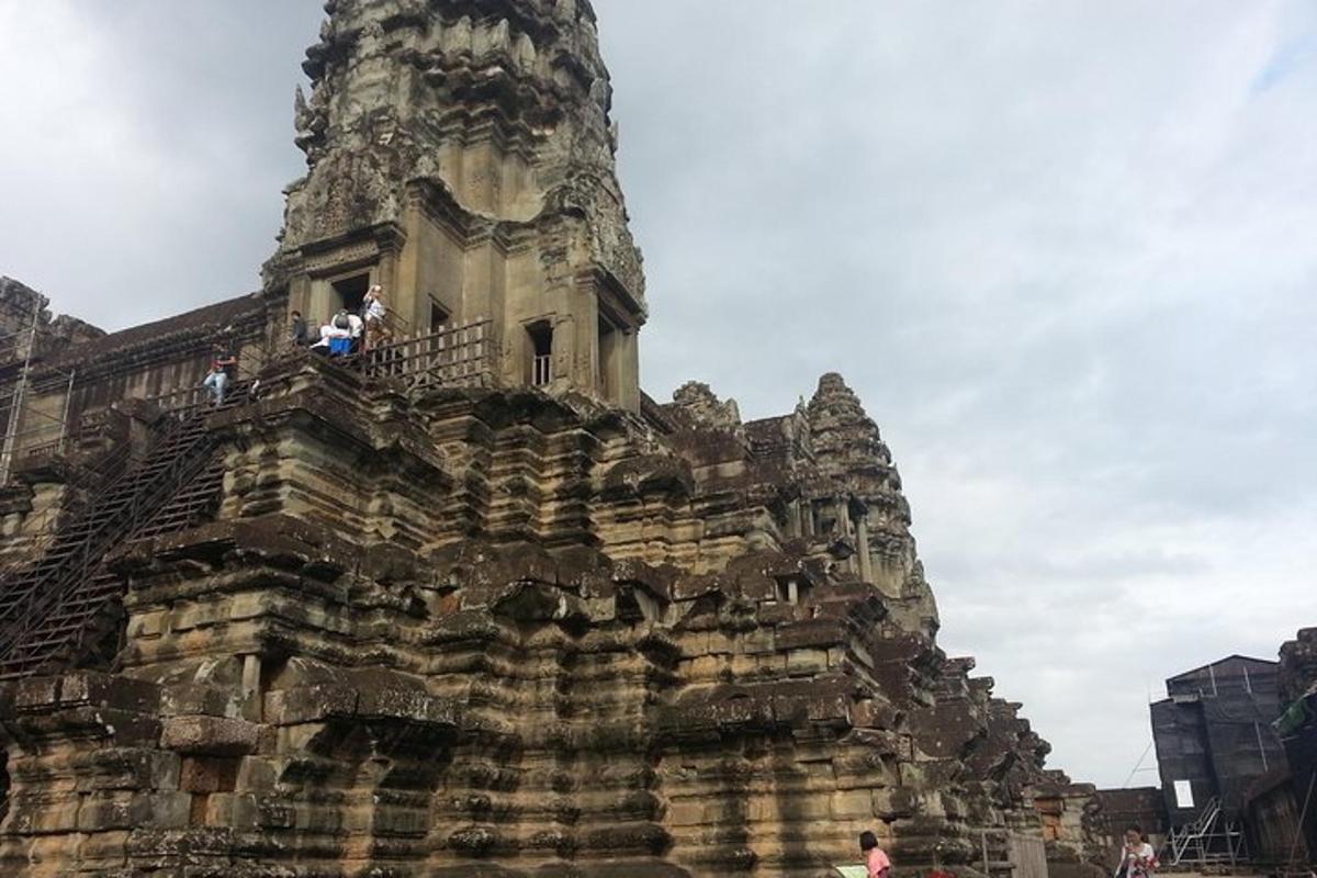 a group of people standing on the top of a building