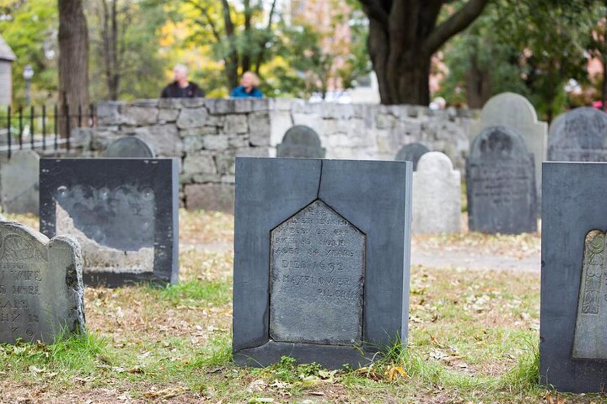 a group of gravestones in a cemetery