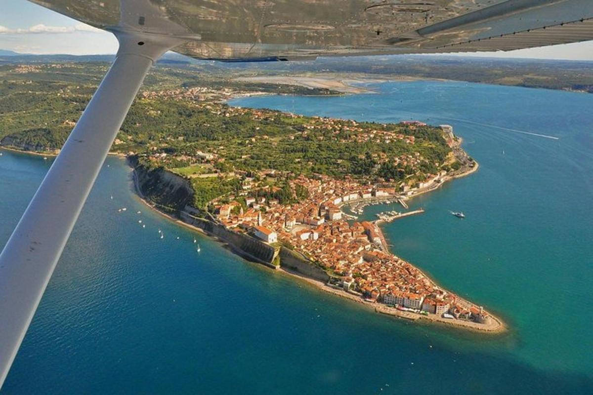 an aerial view of a small island in the water