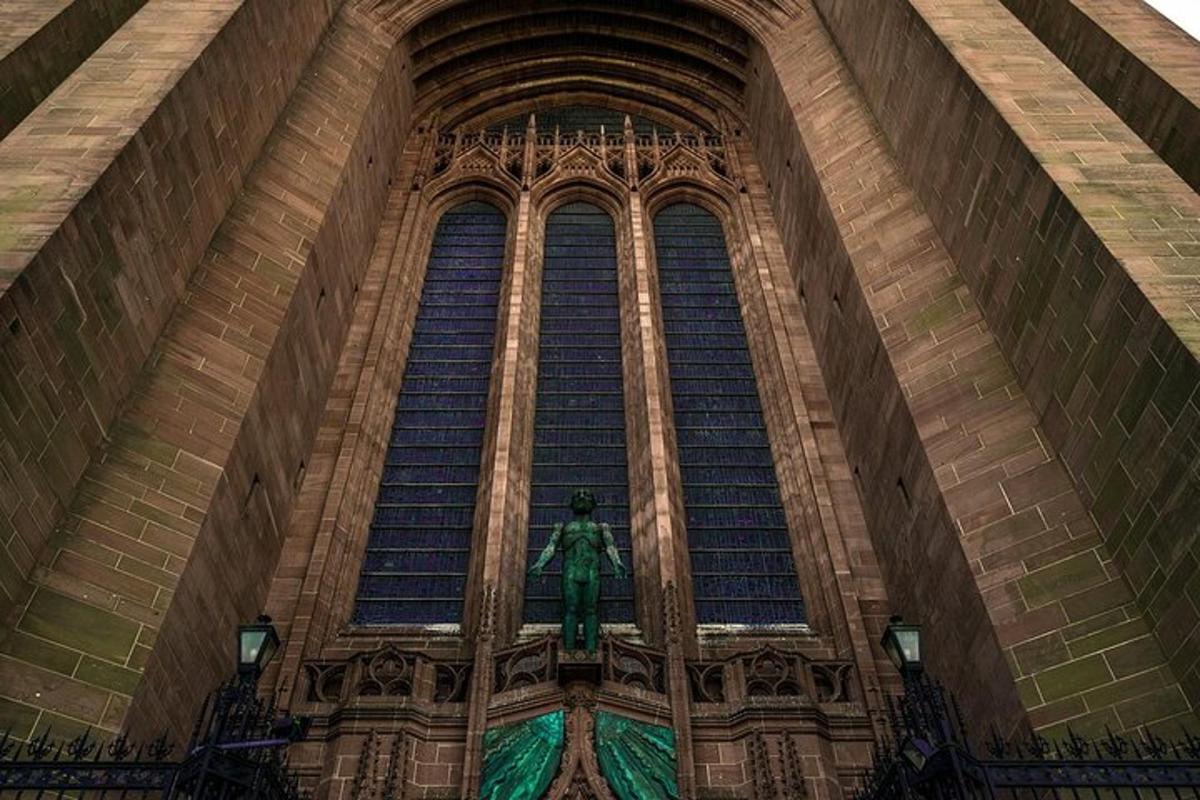 a large window of a building with a statue