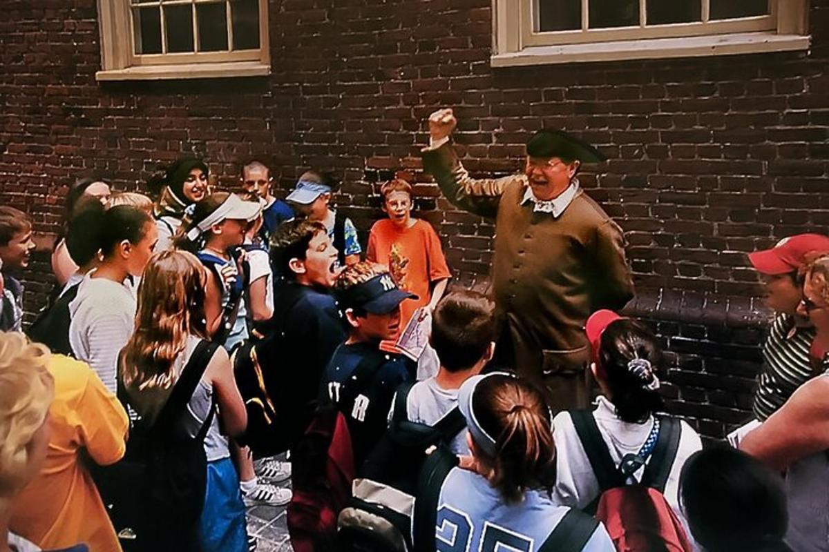 a man standing in front of a crowd of people