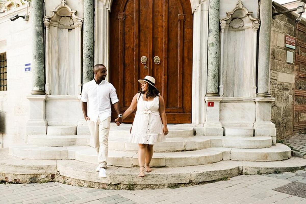 a man and a woman walking down the steps of a building