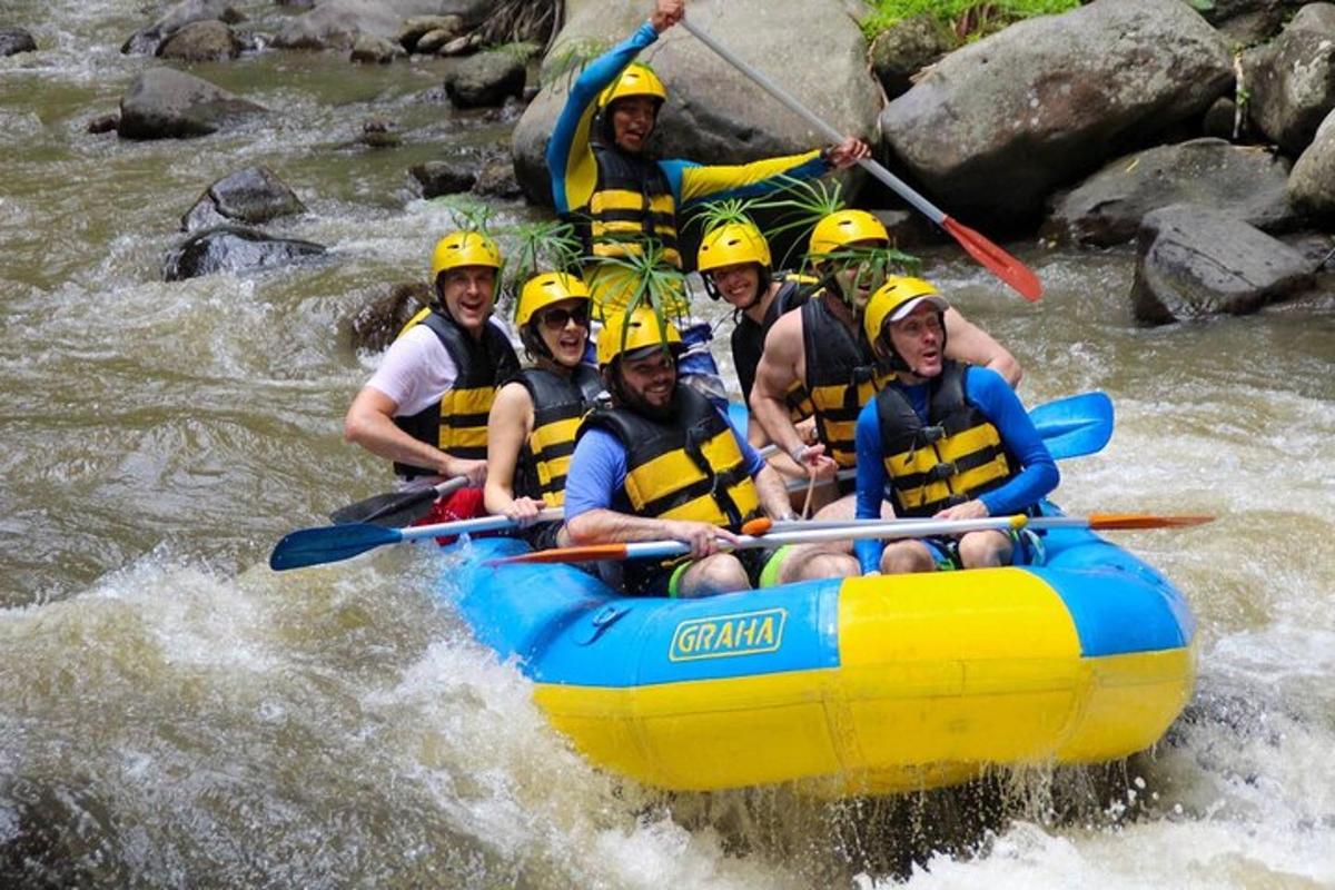 a group of people in a raft on a river