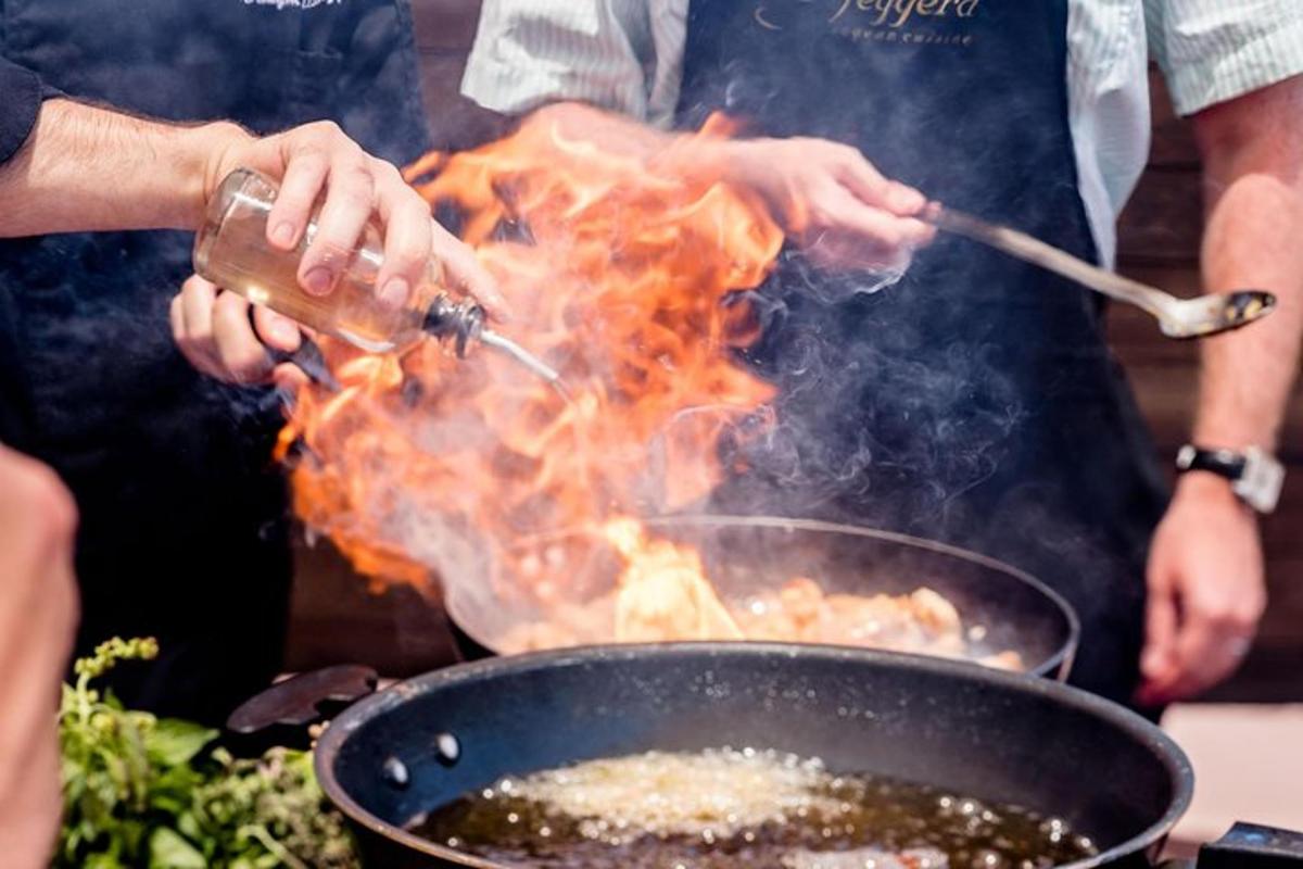 um homem cozinhando comida em uma panela com fogo