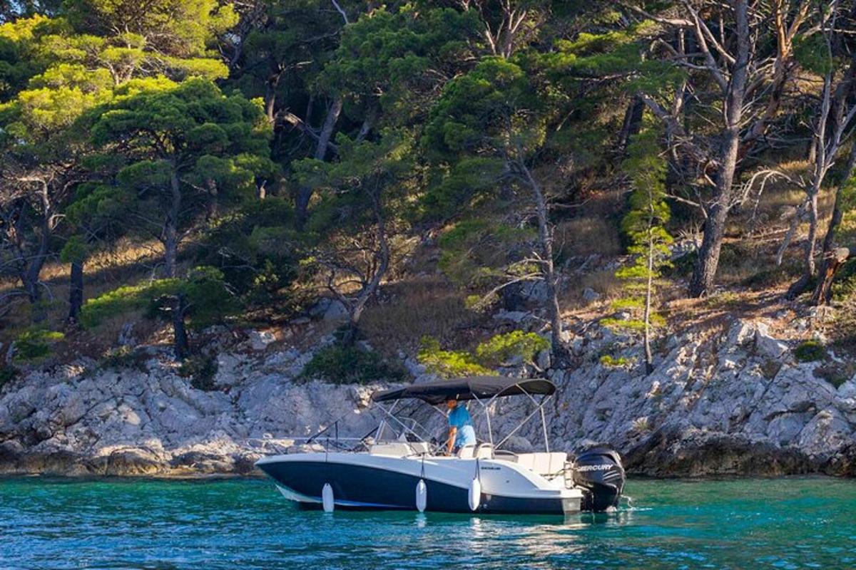a boat in the water with a person on it