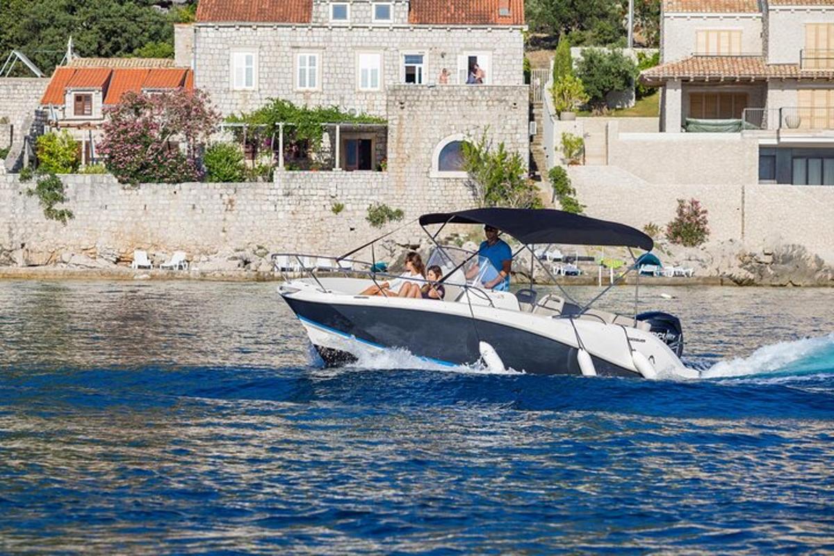 two people on a boat in the water