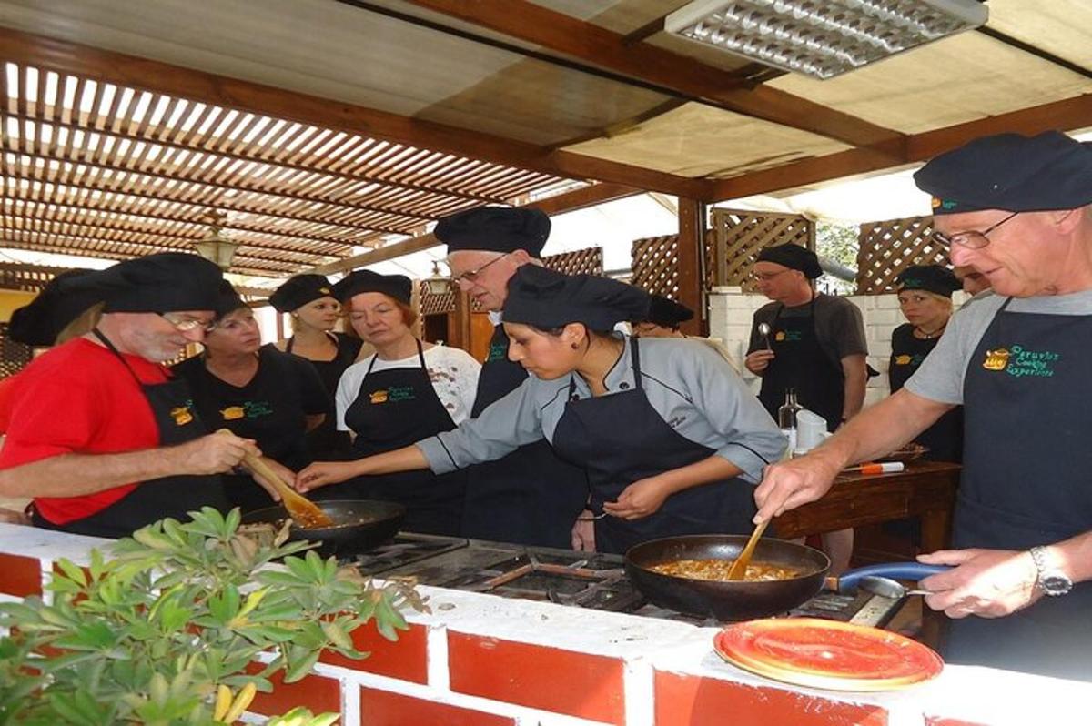 a group of people in a kitchen preparing food