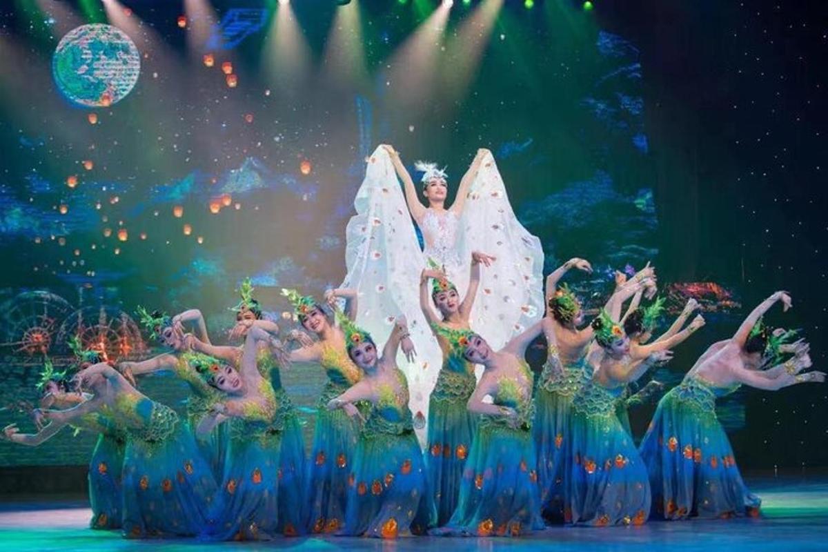 a group of women dancing on a stage