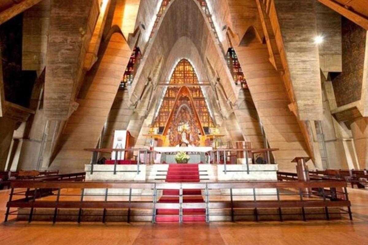 a church with a altar in the middle of it