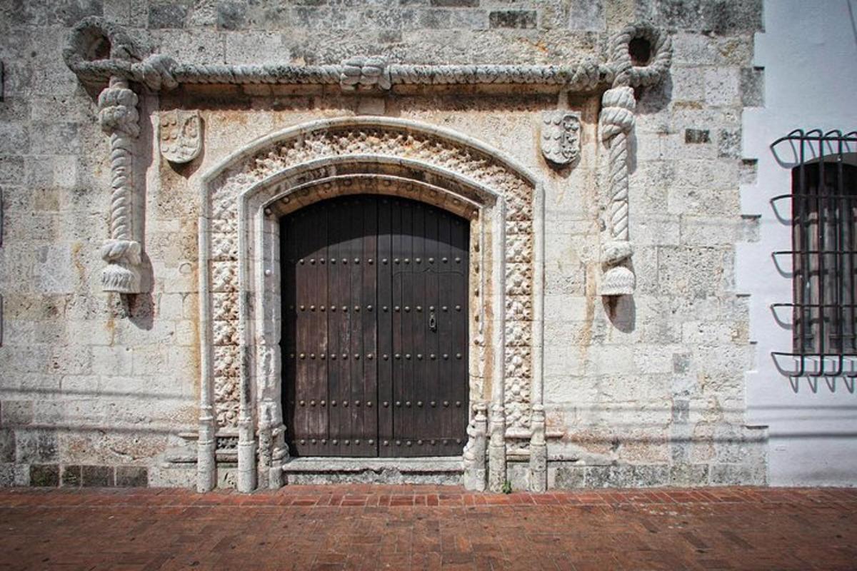 a stone building with a large wooden door