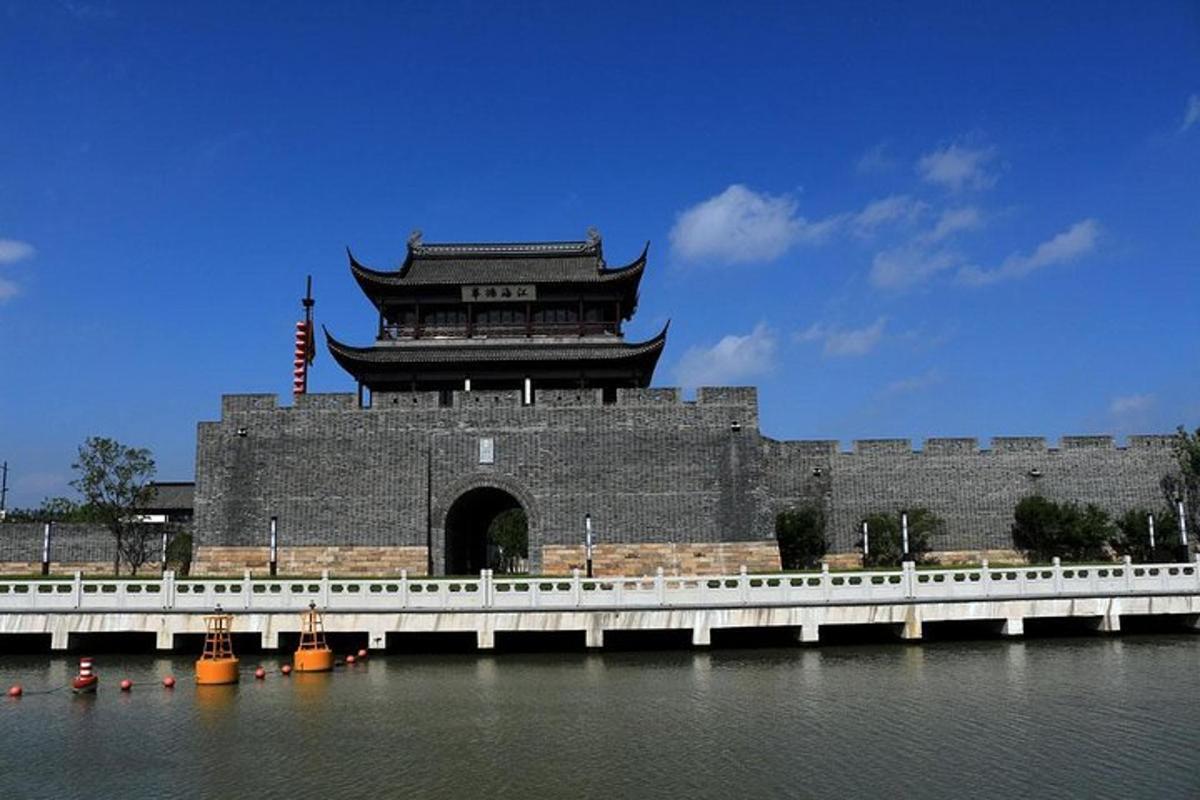 a large castle with a bridge in front of it
