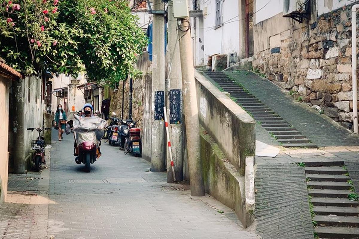 a person riding a motorcycle down a street
