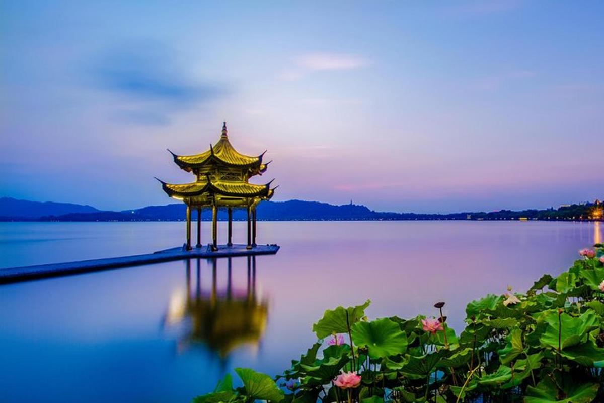 a pagoda in the middle of a body of water