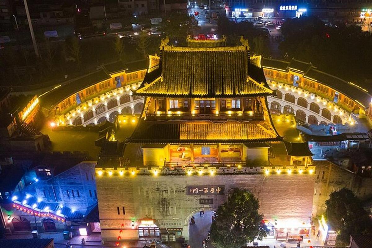 a building with a chinese roof at night