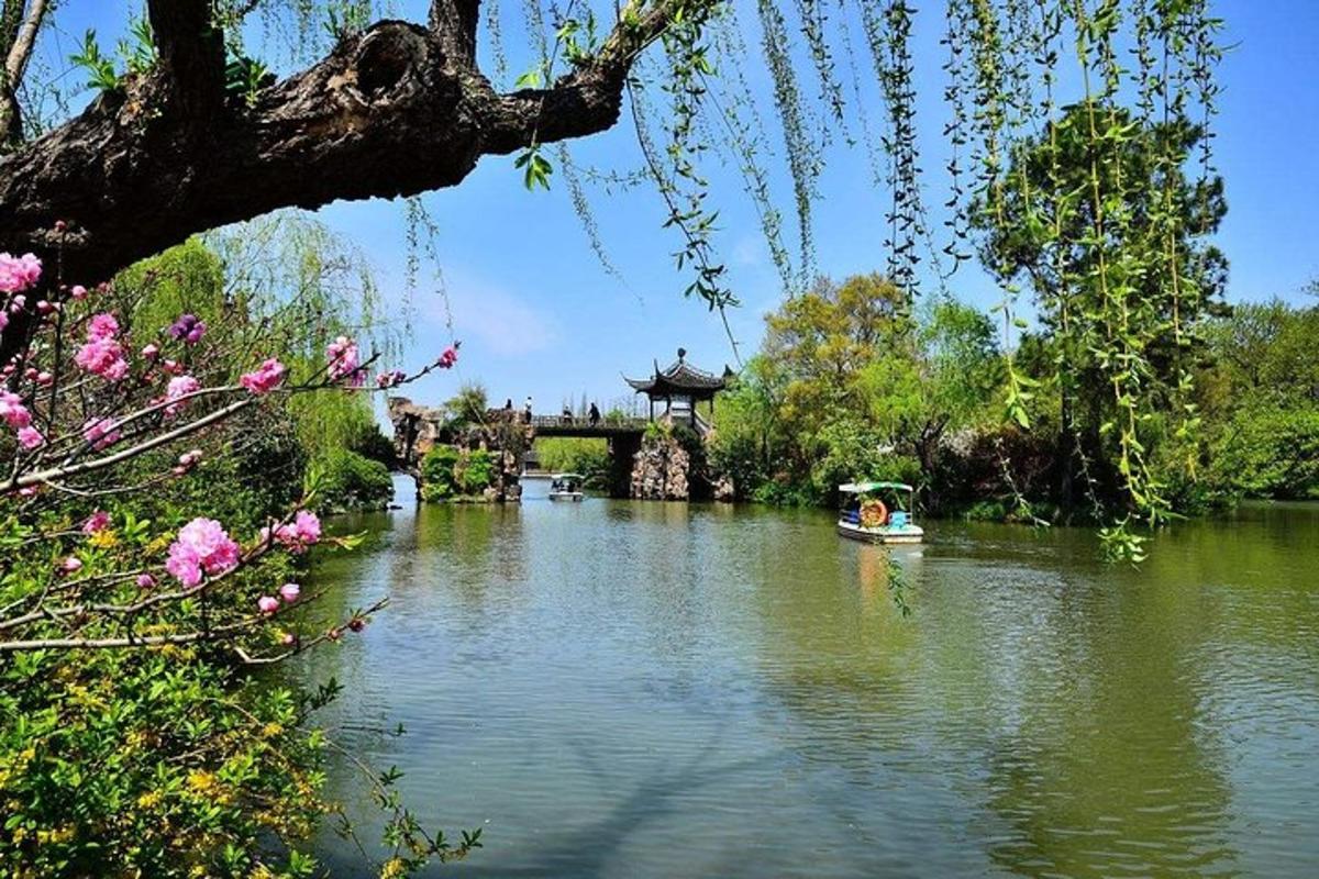 a boat on a river with a pagoda in the distance