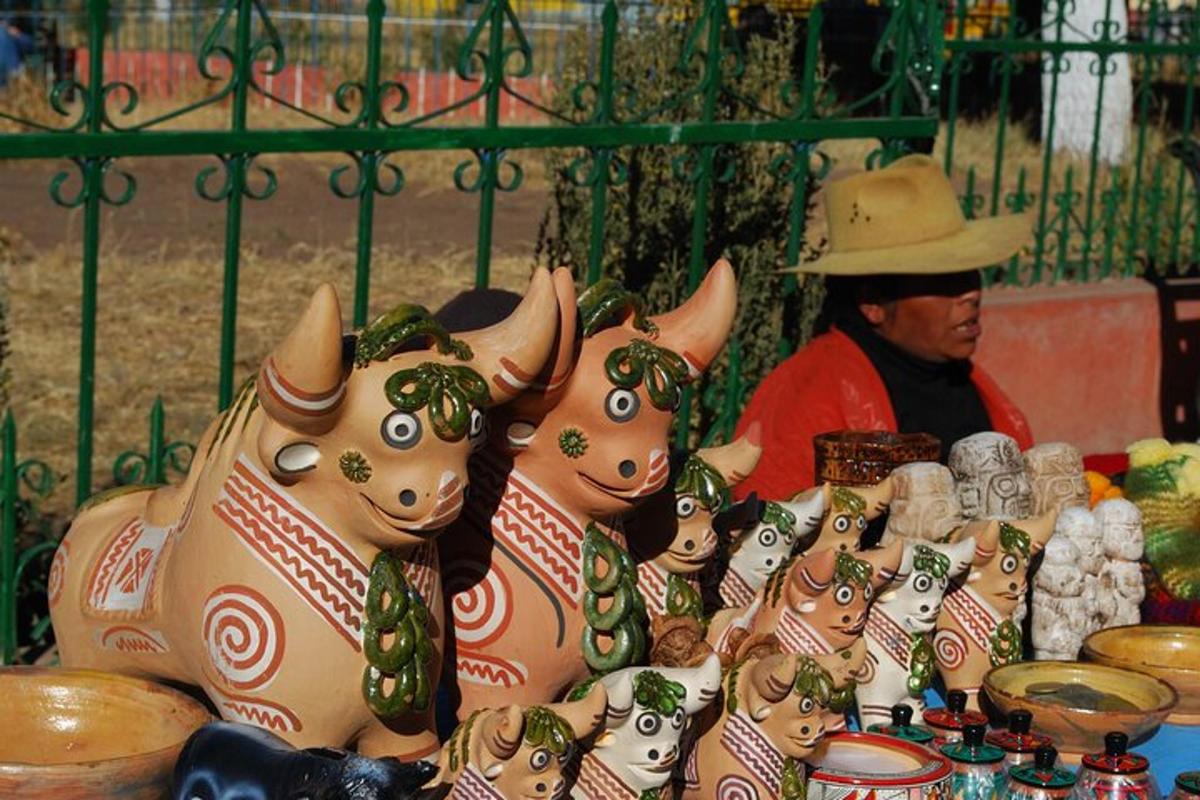 a man in a hat standing next to a group of masks