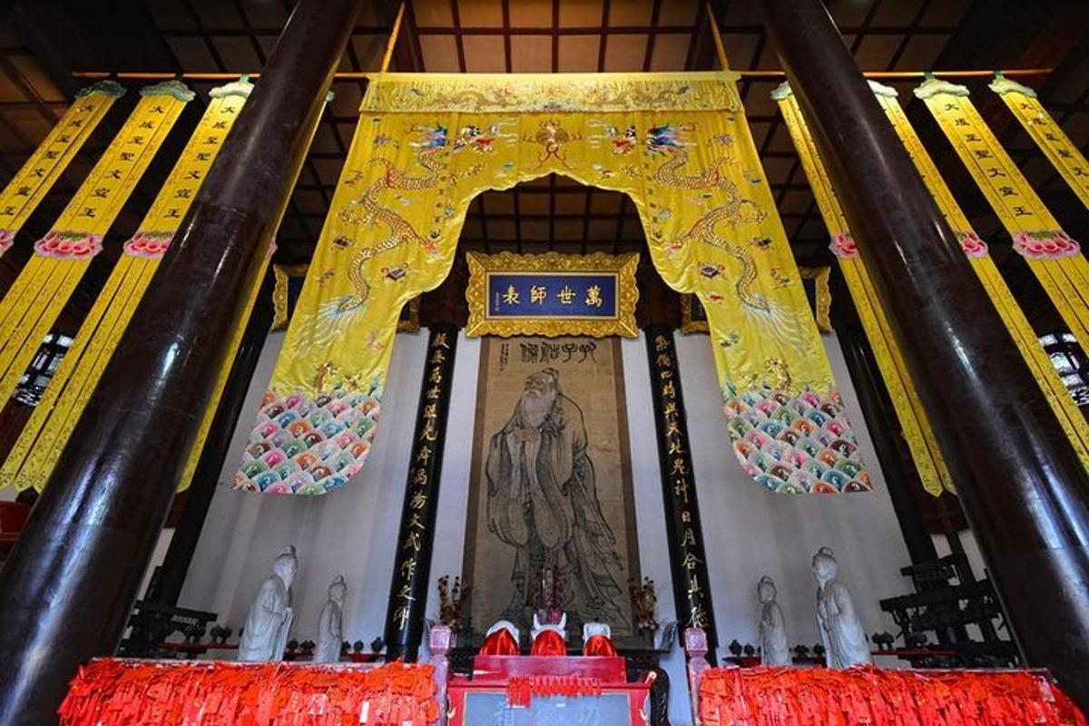 a shrine with a picture of a woman in a room