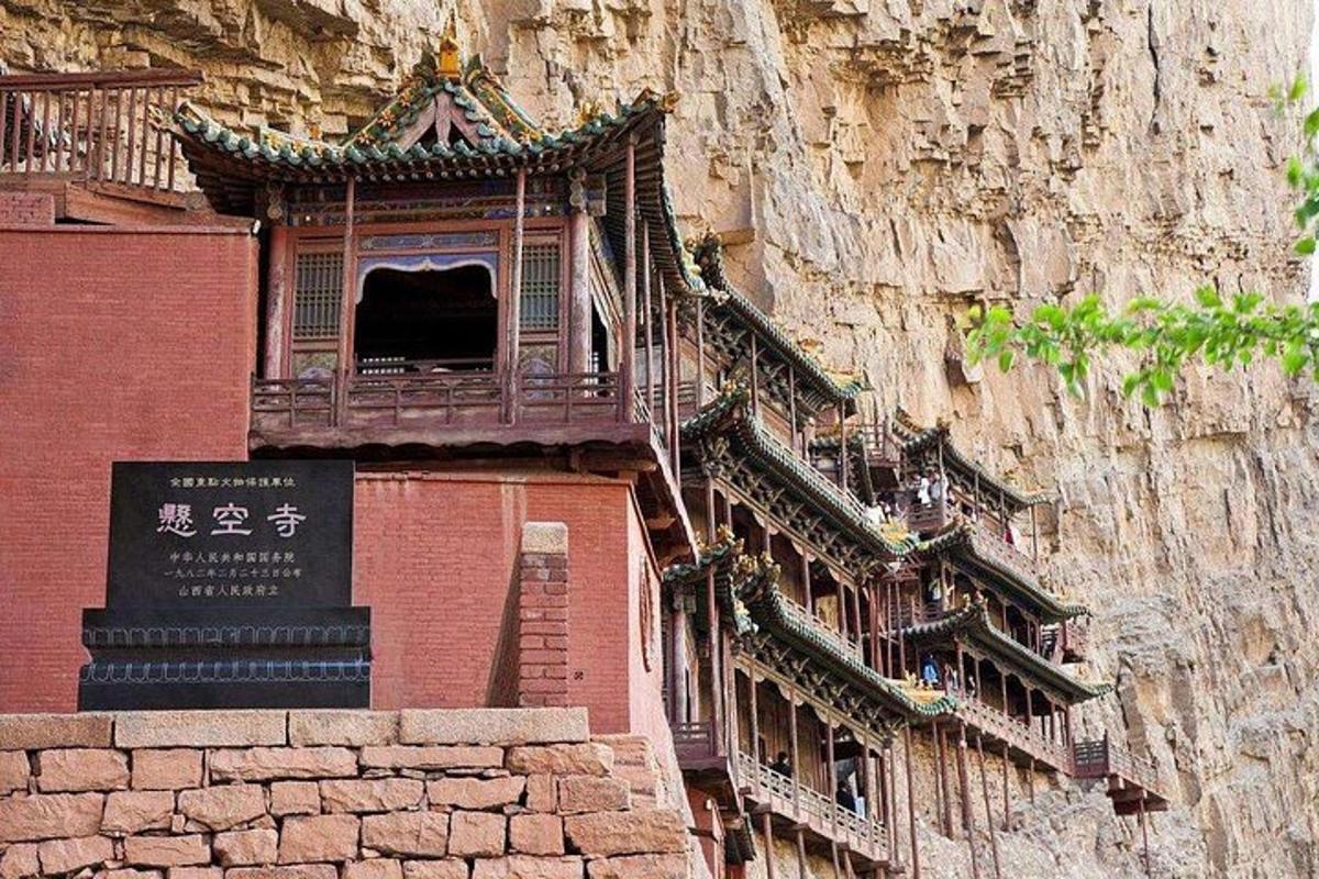 a building on the side of a mountain