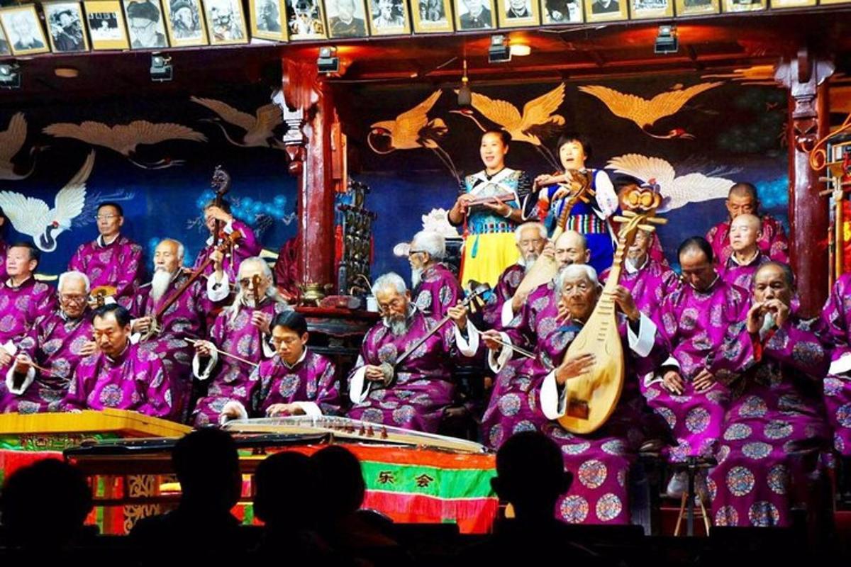 a group of men in purple performing a performance