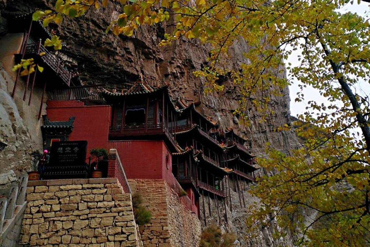 a building on the side of a mountain