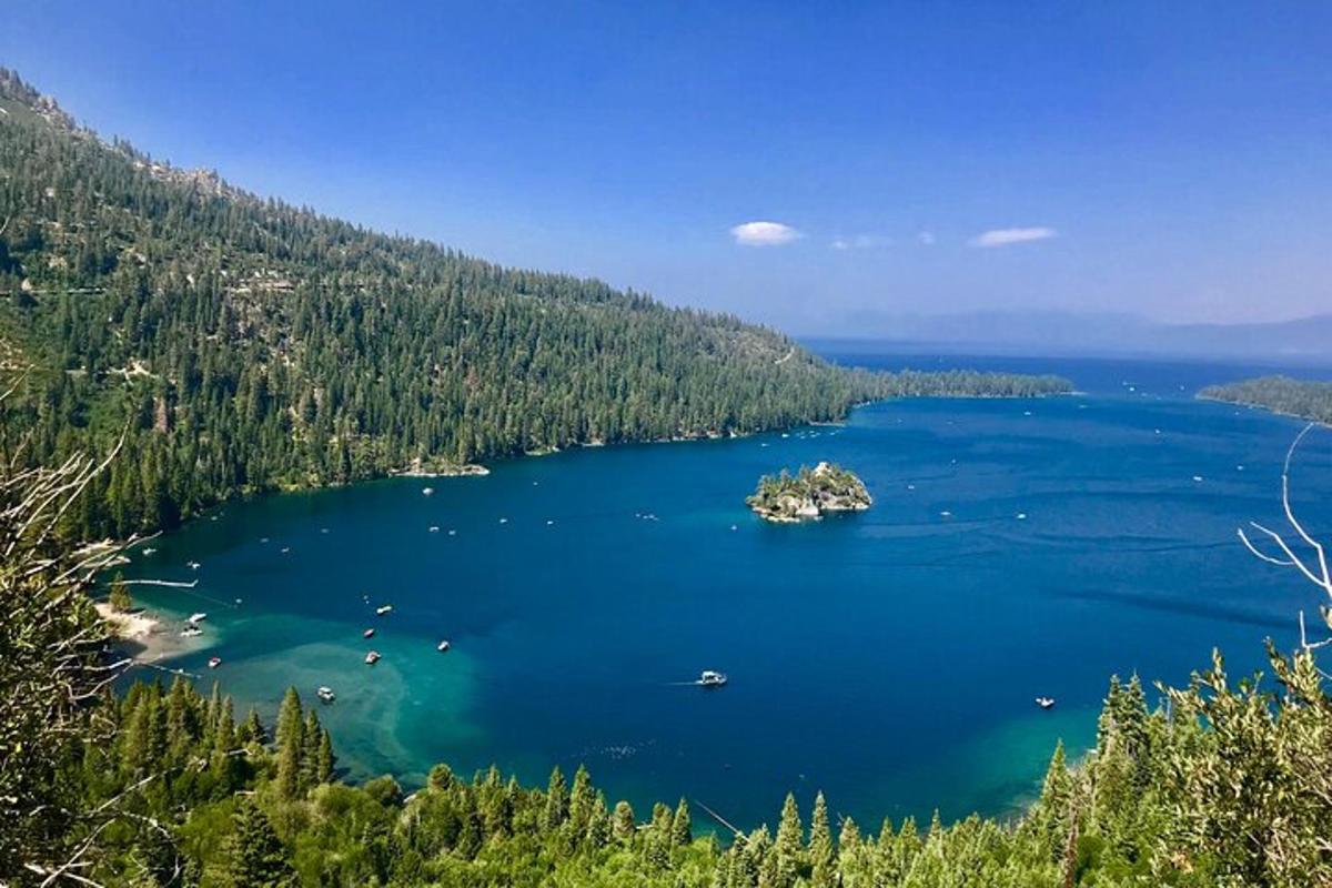 a large lake with a small island in the middle