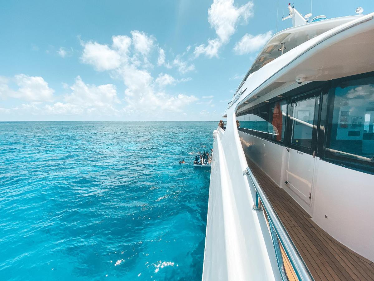 a view of the ocean from the side of a boat