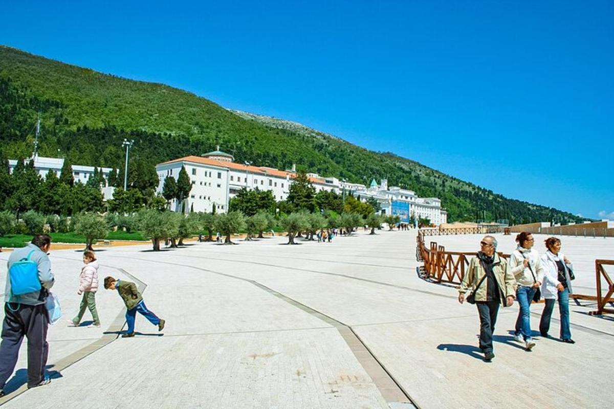 a group of people walking down a street