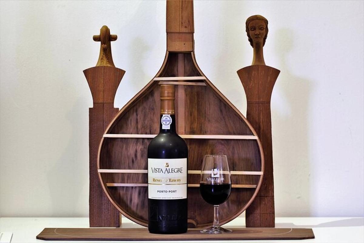 a bottle of wine and a glass on a table