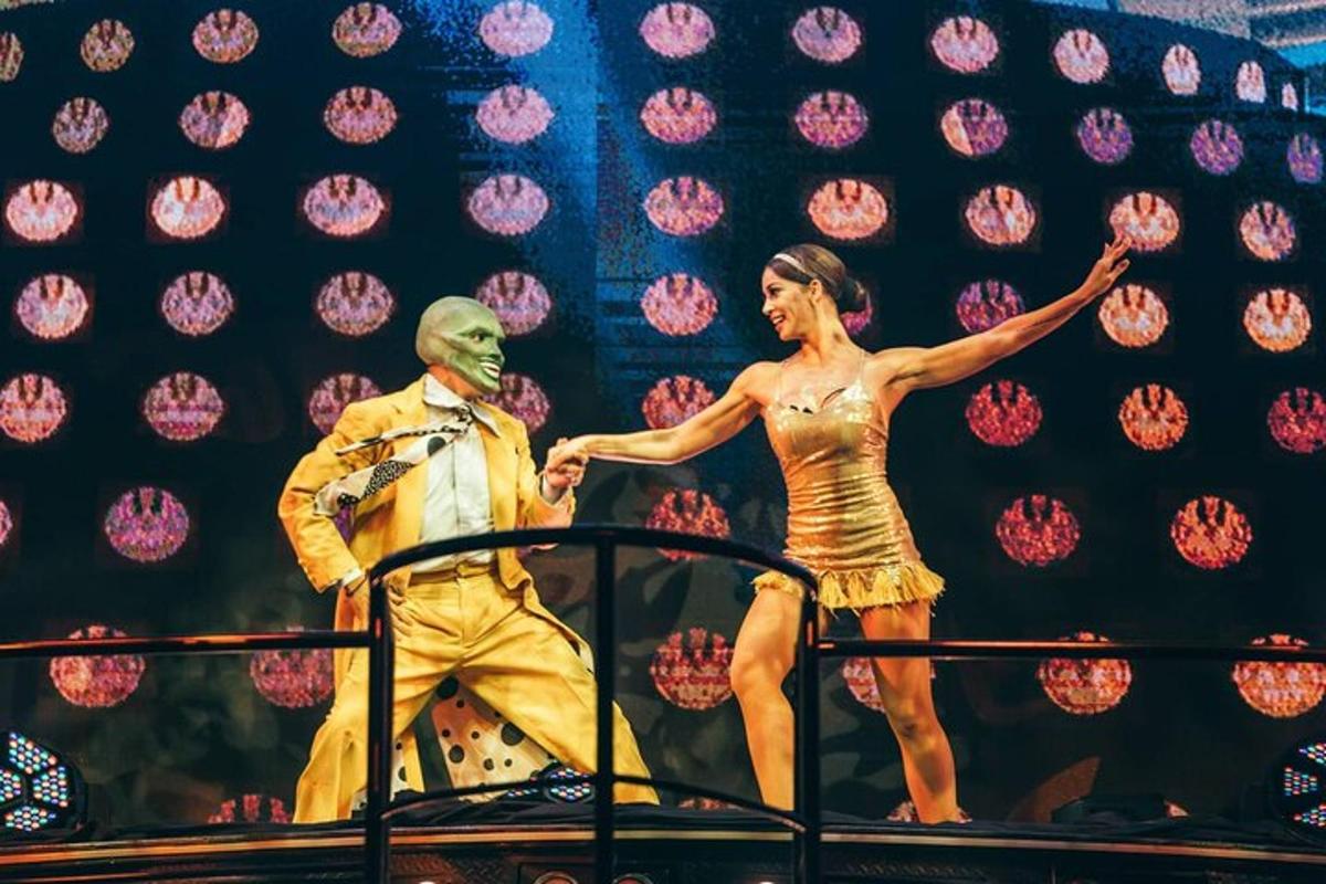 a man and a woman standing on a stage