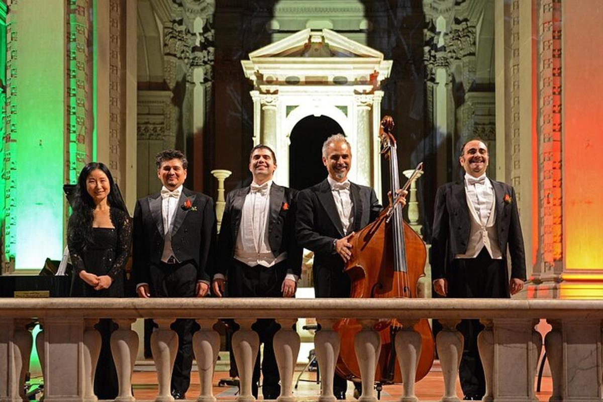 a group of people posing for a picture with aviolin