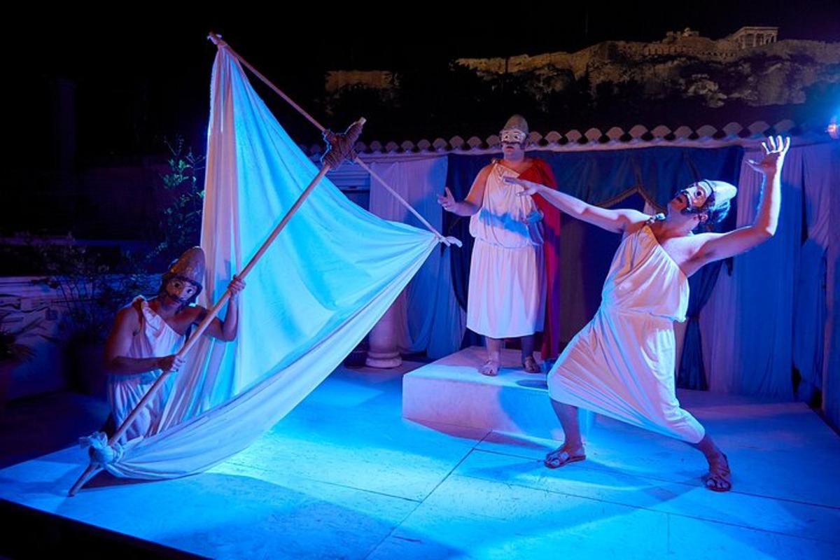 a group of women standing on stage with an umbrella