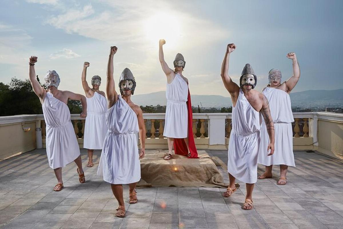 a group of people standing on a roof with their hands in the air