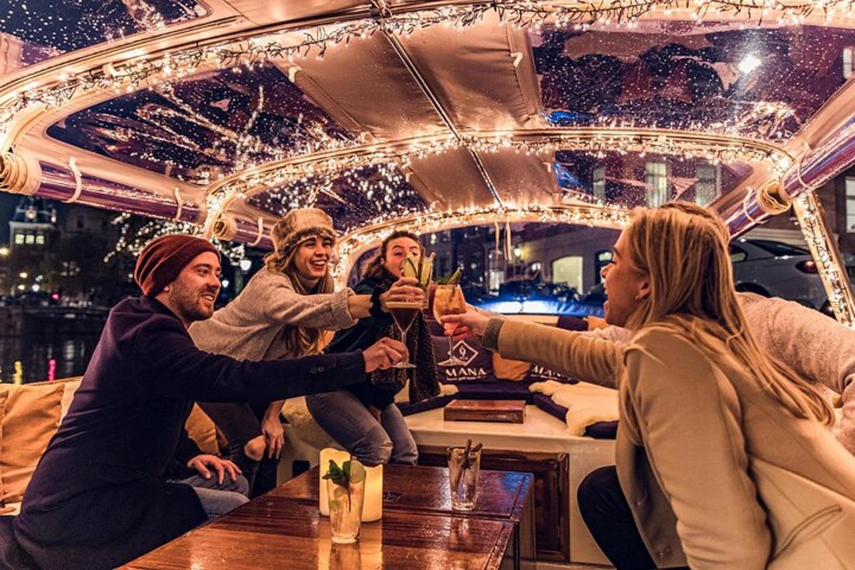 a group of people sitting around a table with drinks