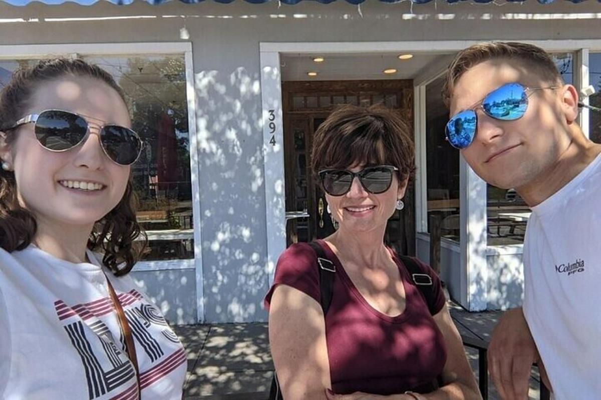 a man and two women are wearing sunglasses