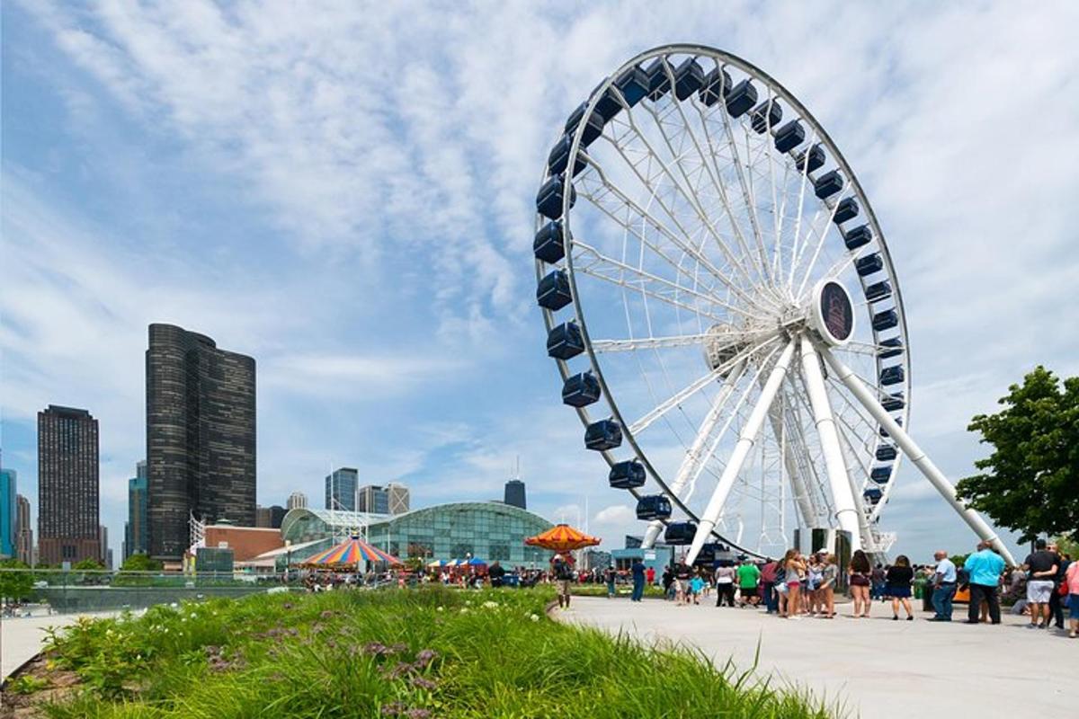 a large ferris wheel in front of a city