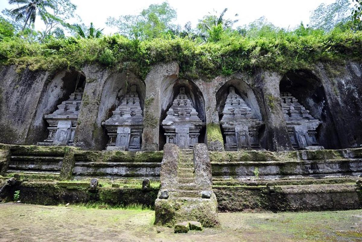 a stone building with a staircase in front of it