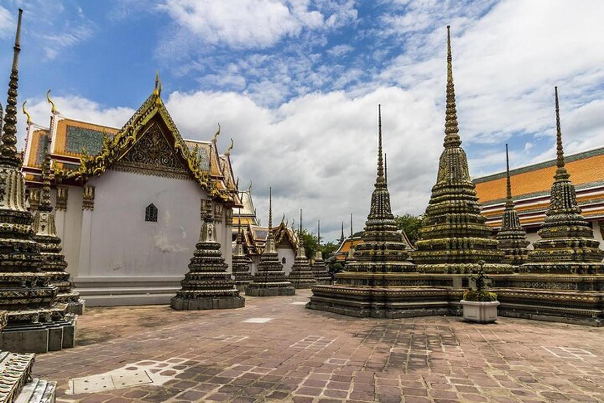 a group of pagodas in front of a building