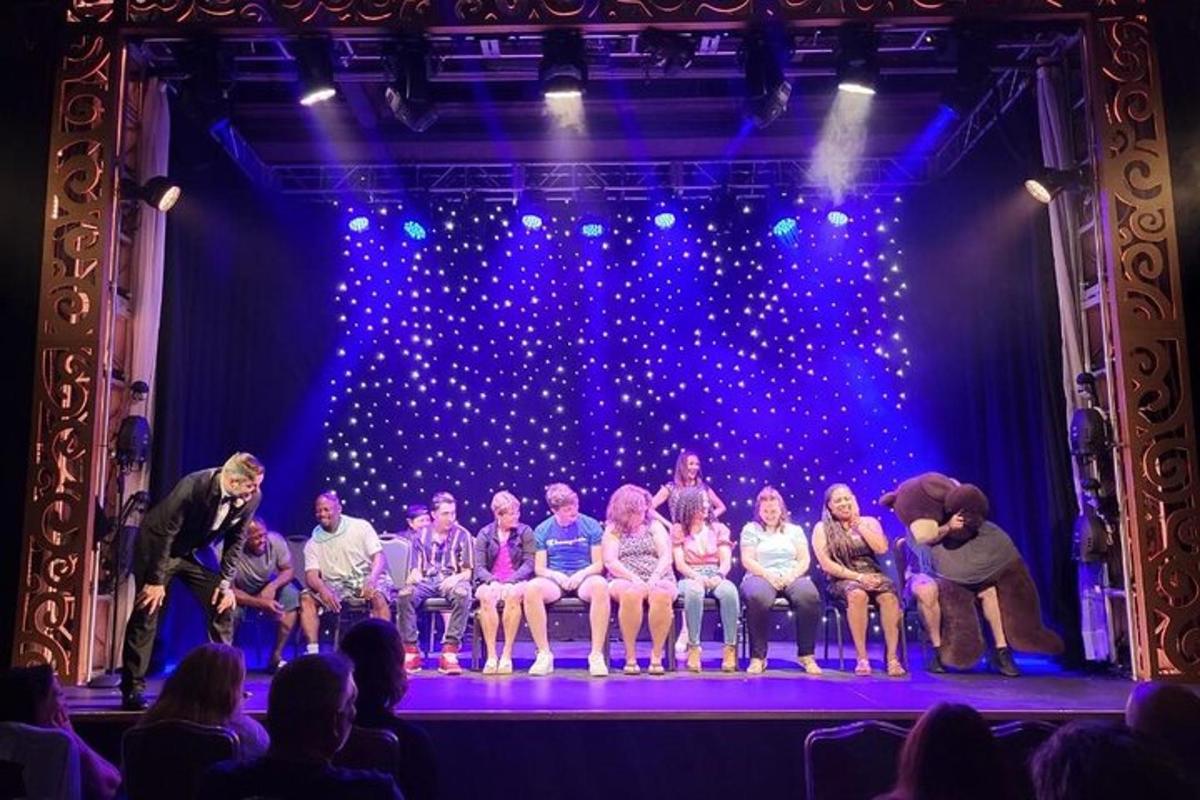 a group of people sitting on a stage