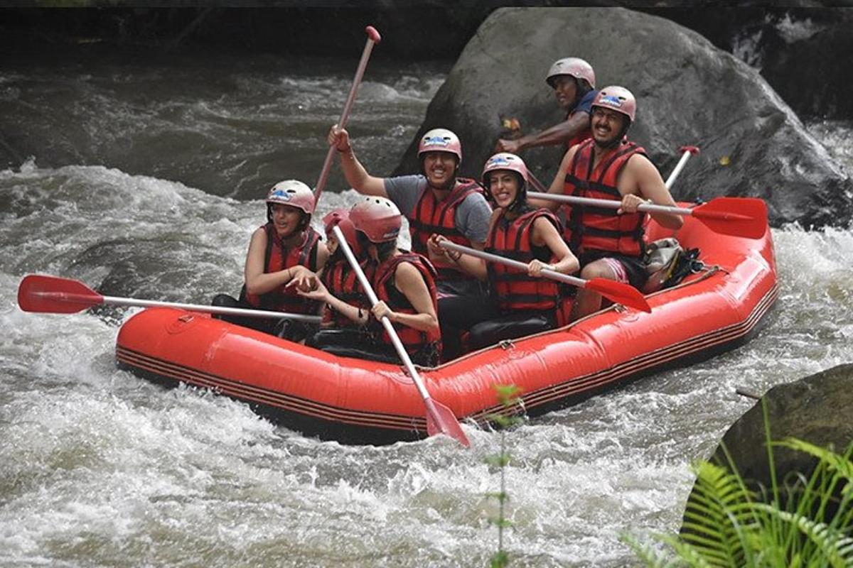 a group of people in a raft on a river