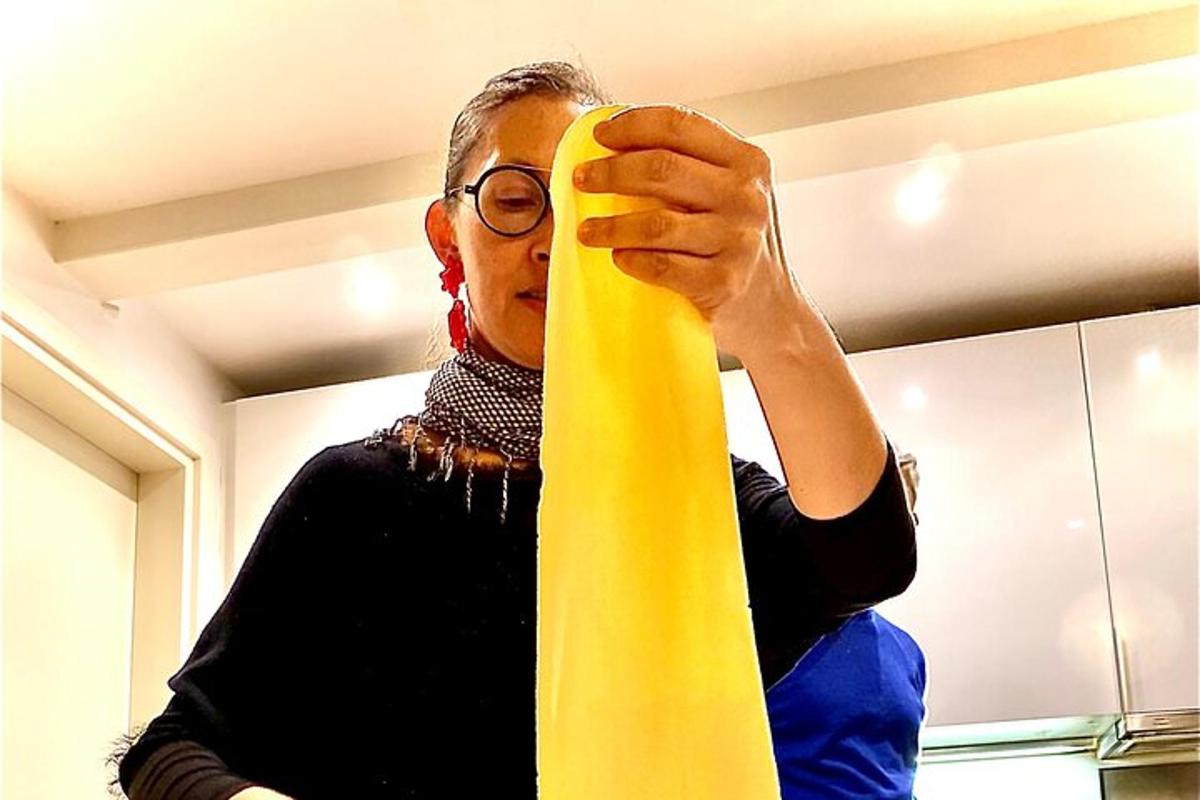 a woman holding a banana in front of her face