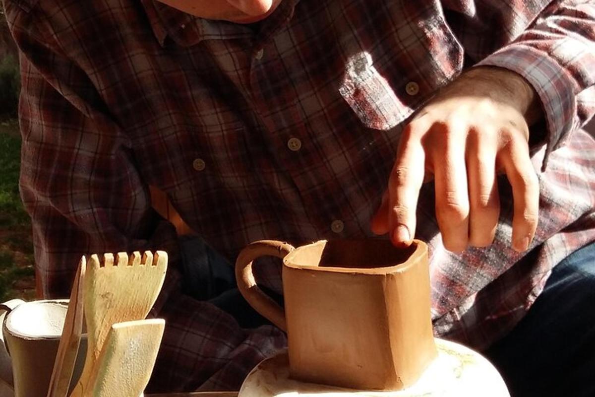 a man is pouring coffee into a cup