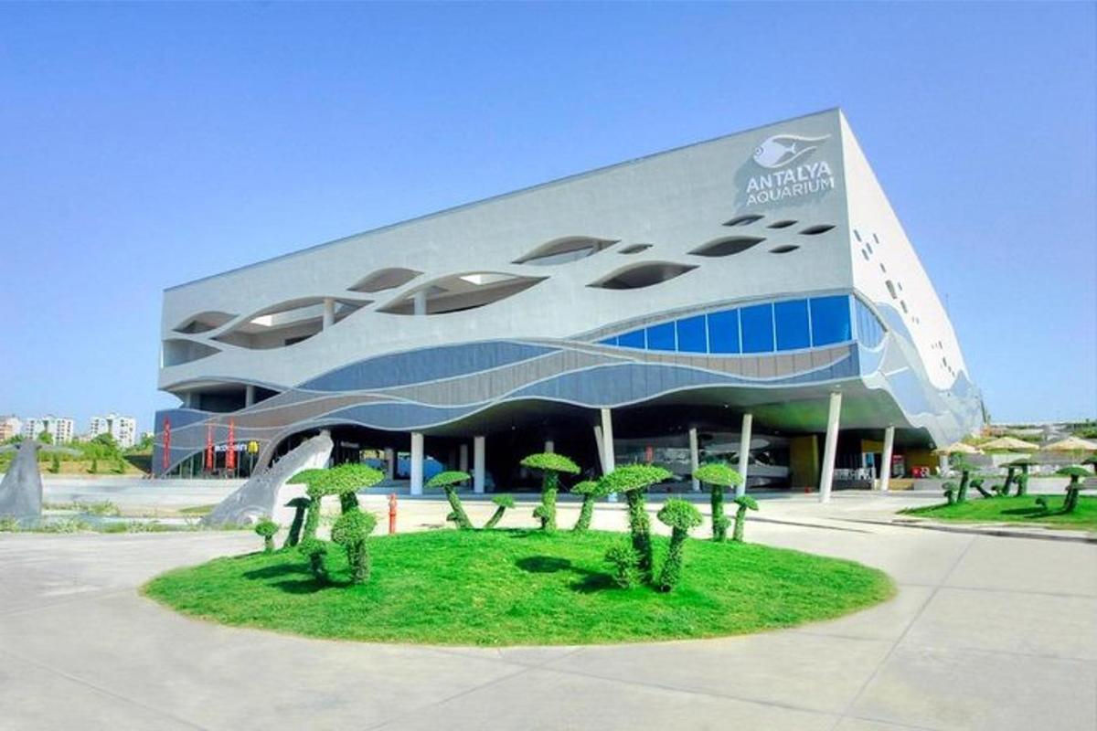 a large building with trees in front of it