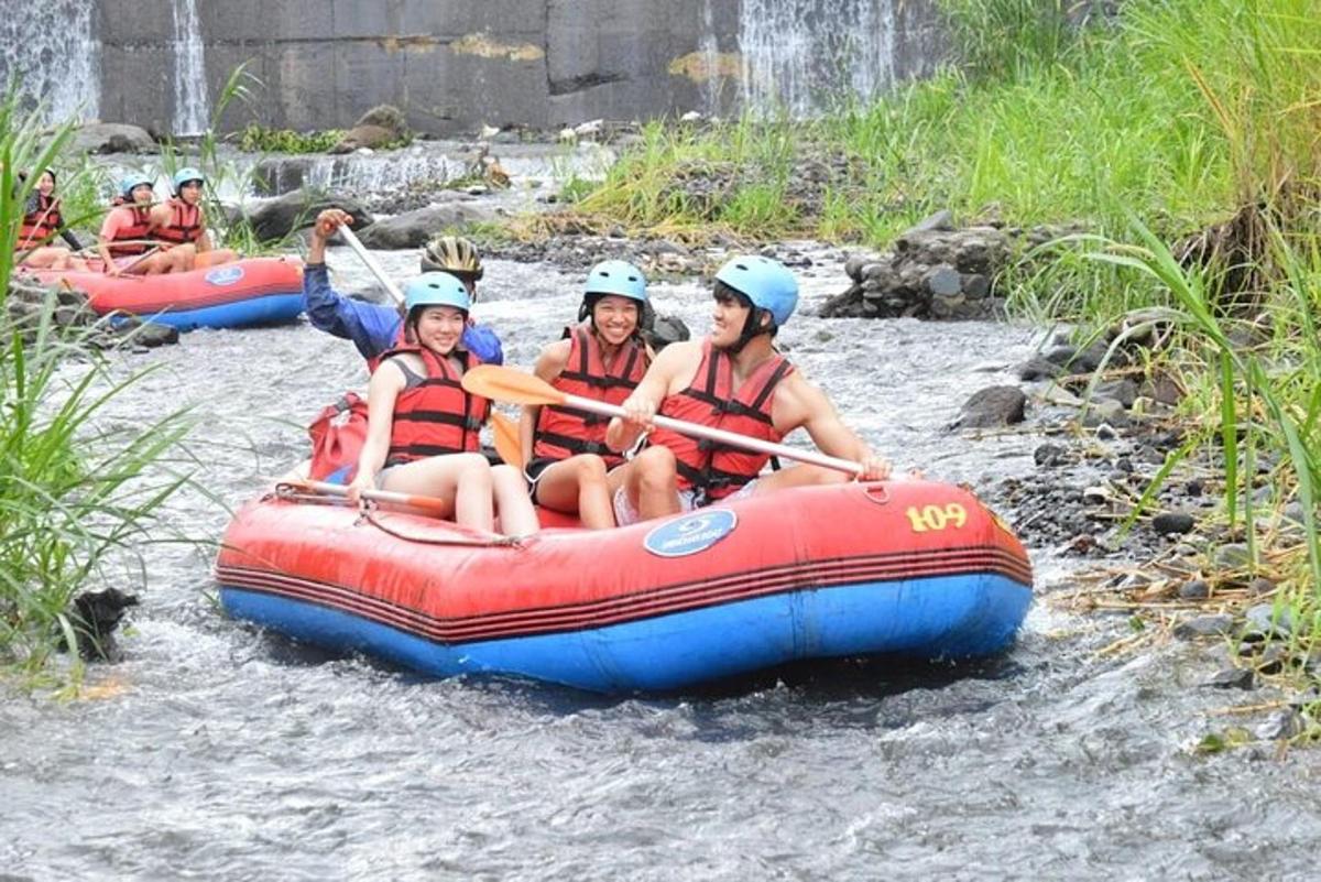 a group of people are rafting on a river
