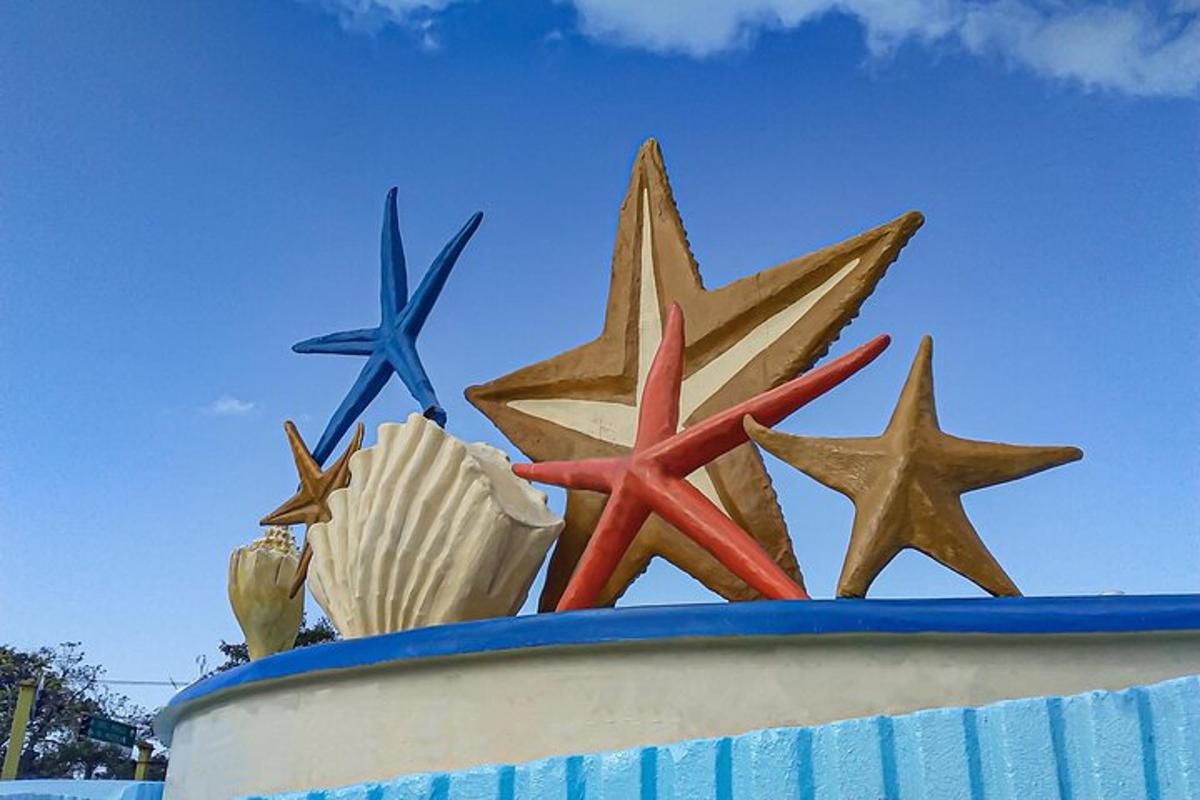 a group of stars on top of a statue