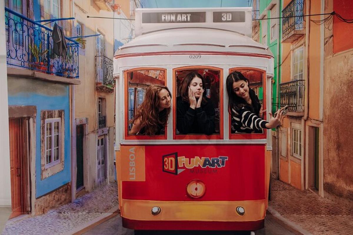 a red trolley car with people riding on