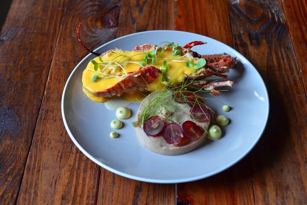 a white plate with food on a wooden table