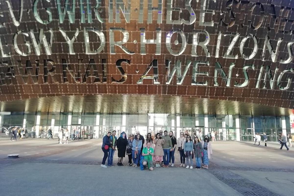 a group of people standing in front of a building