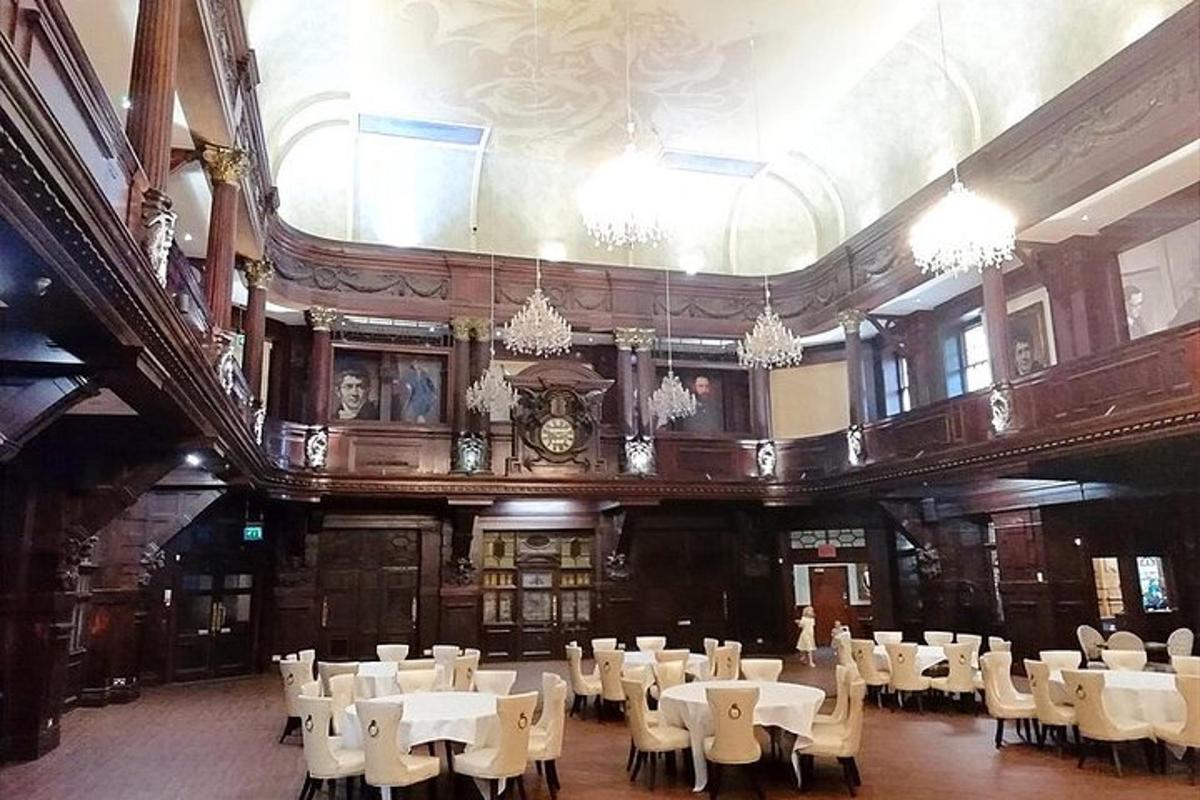 a large room with white tables and chairs